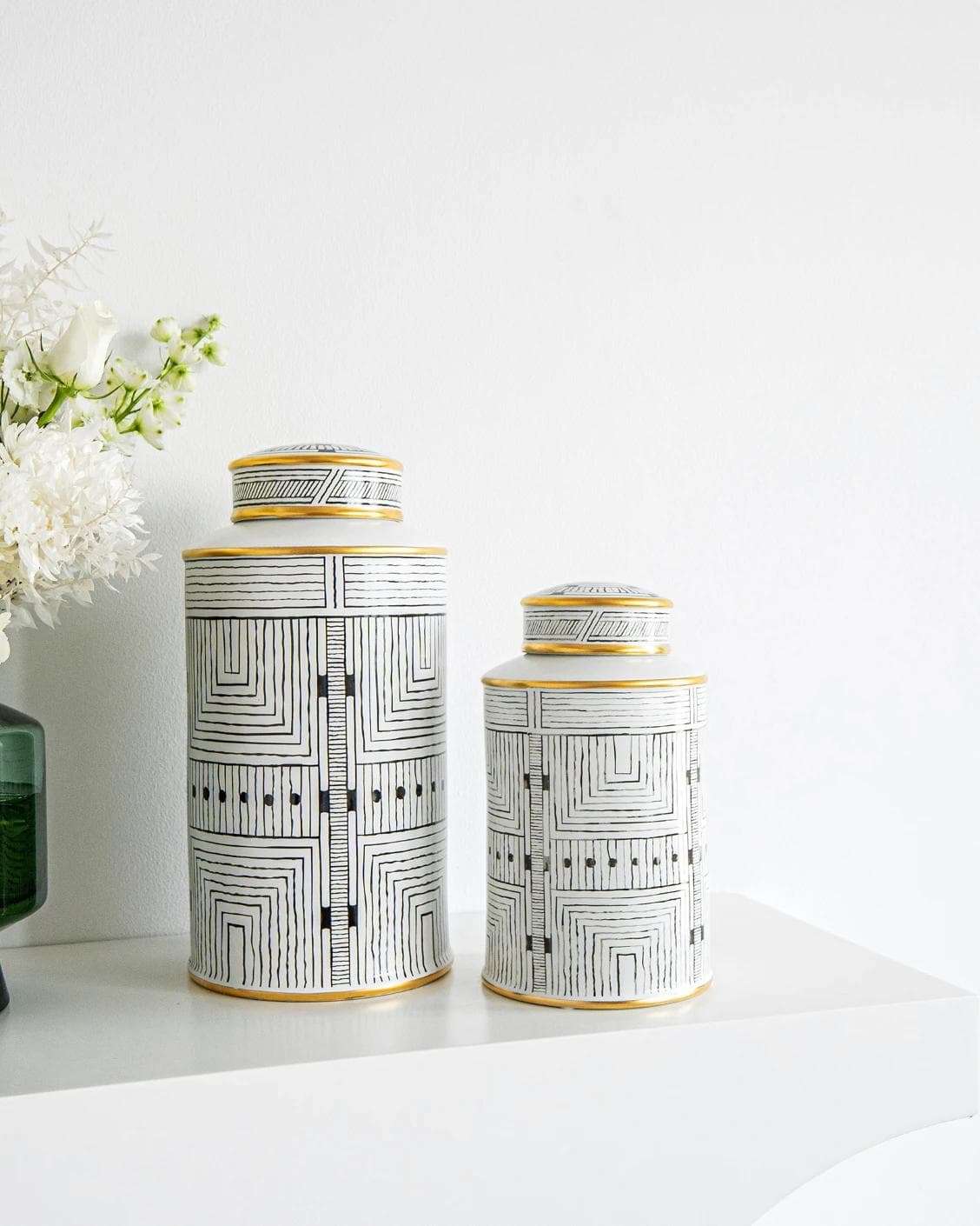 Maze Bundle canisters in black and white, shown in a lifestyle front view as image 2