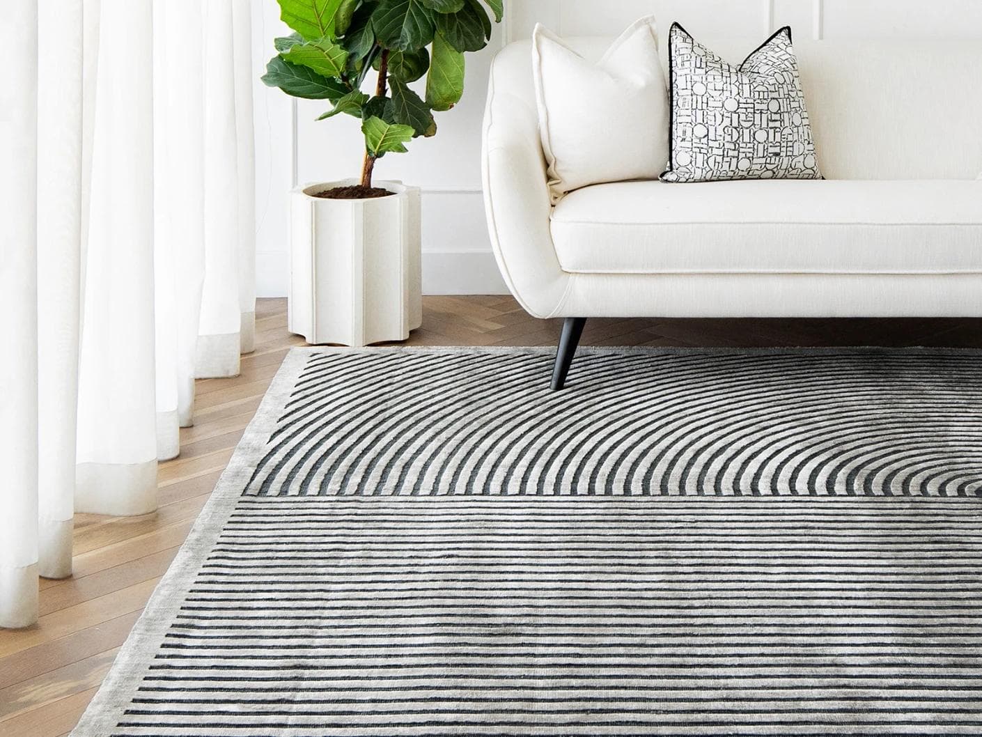Maze Ebony carpet in grey and charcoal, shown in a lifestyle front view as image 4