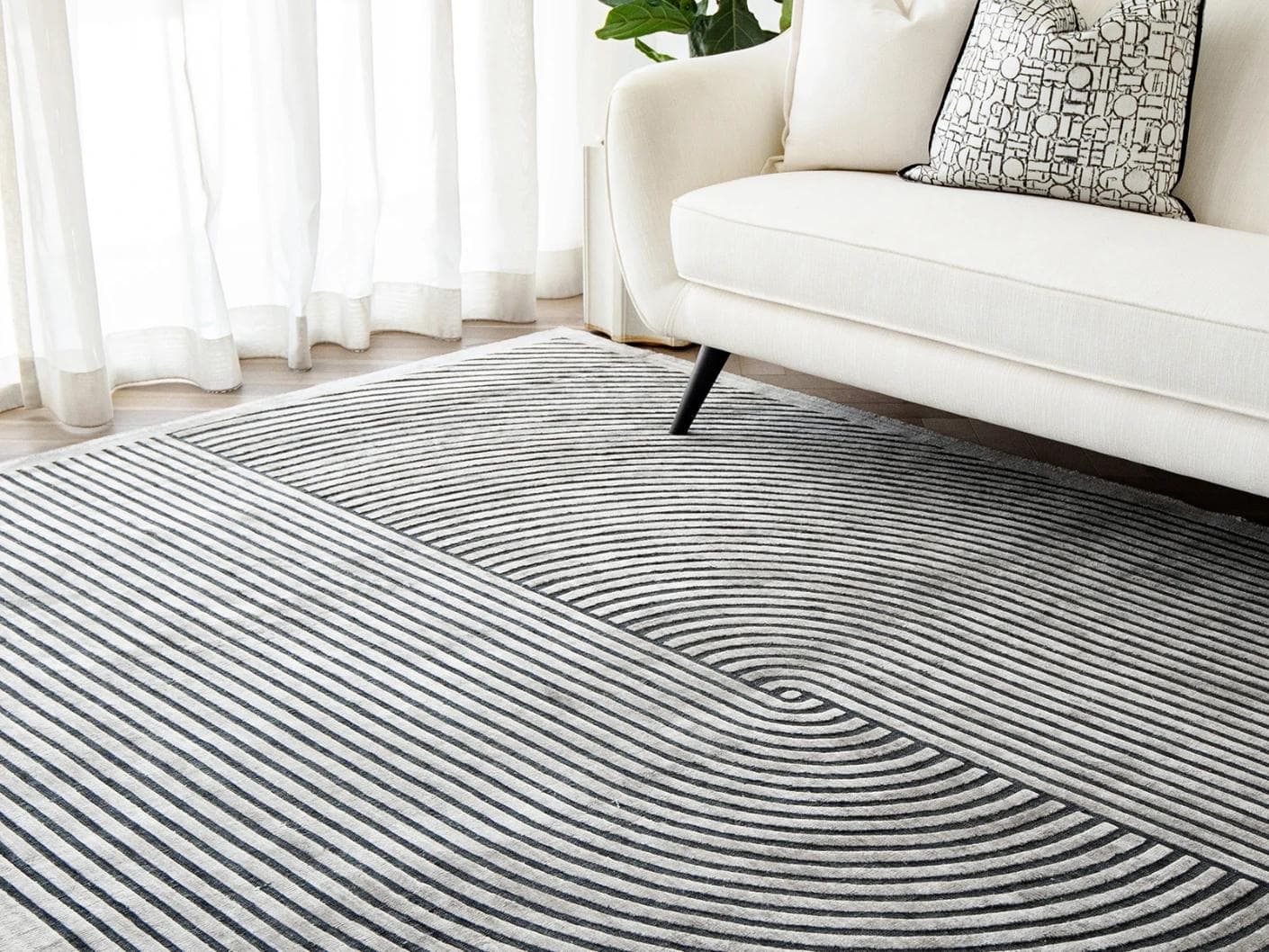 Maze Ebony carpet in grey and charcoal, shown in a lifestyle right view as image 5