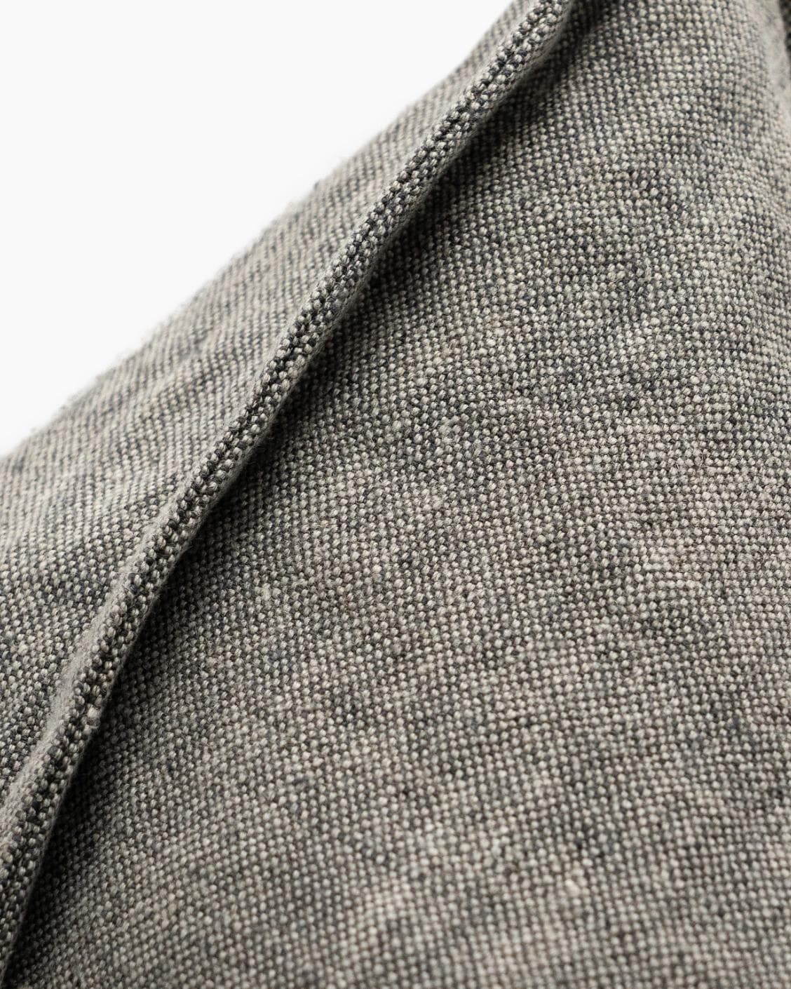 Mel Ash cushion in grey, shown in a product close-up as image 6