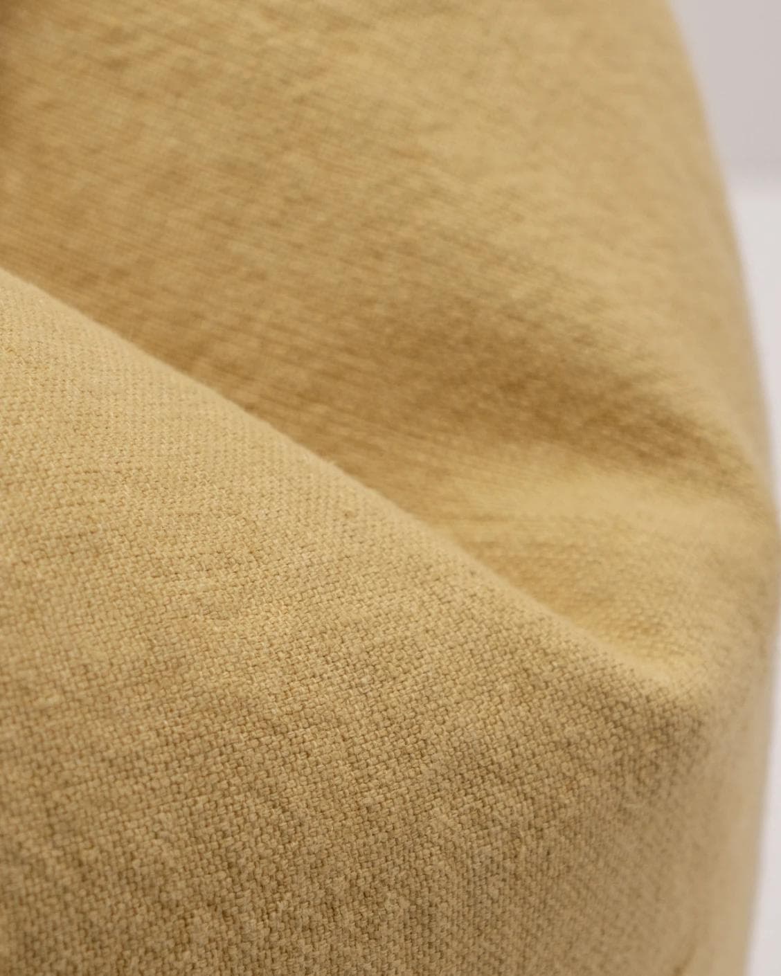 Mel Barrymore cushion in yellow, shown in a product close-up as image 8
