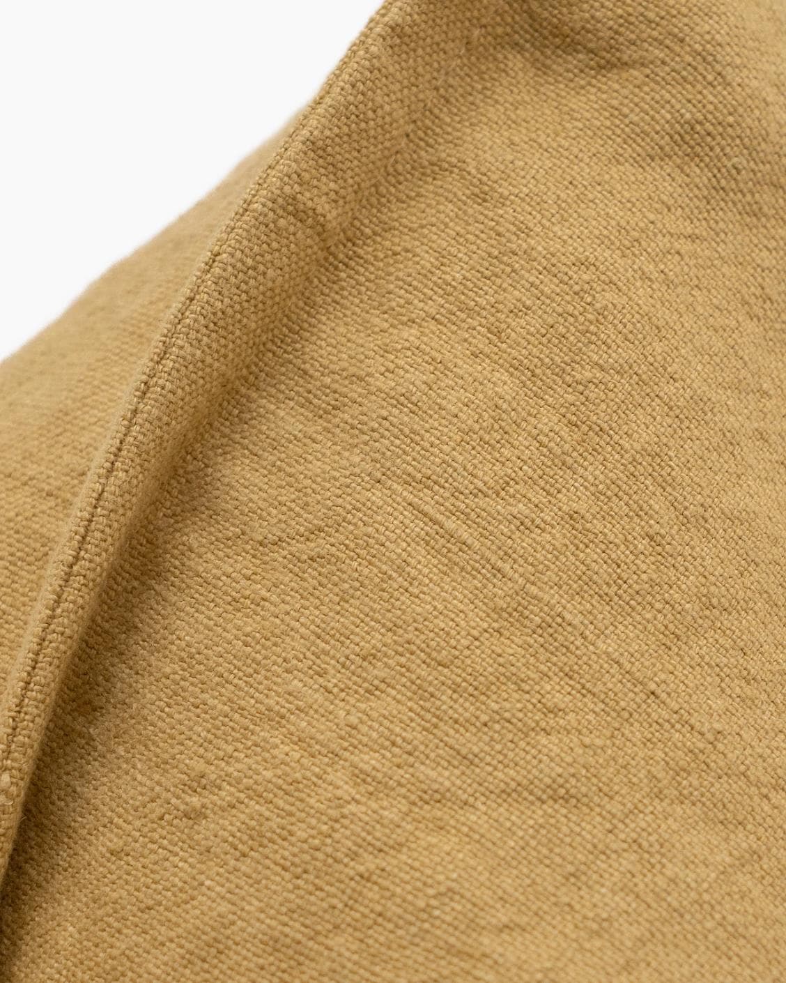 Mel Barrymore cushion in yellow, shown in a product close-up as image 9