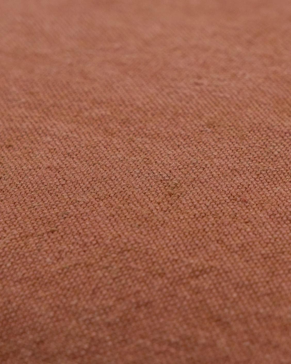 Mel Brick cushion in rust, shown in a product close-up as image 6