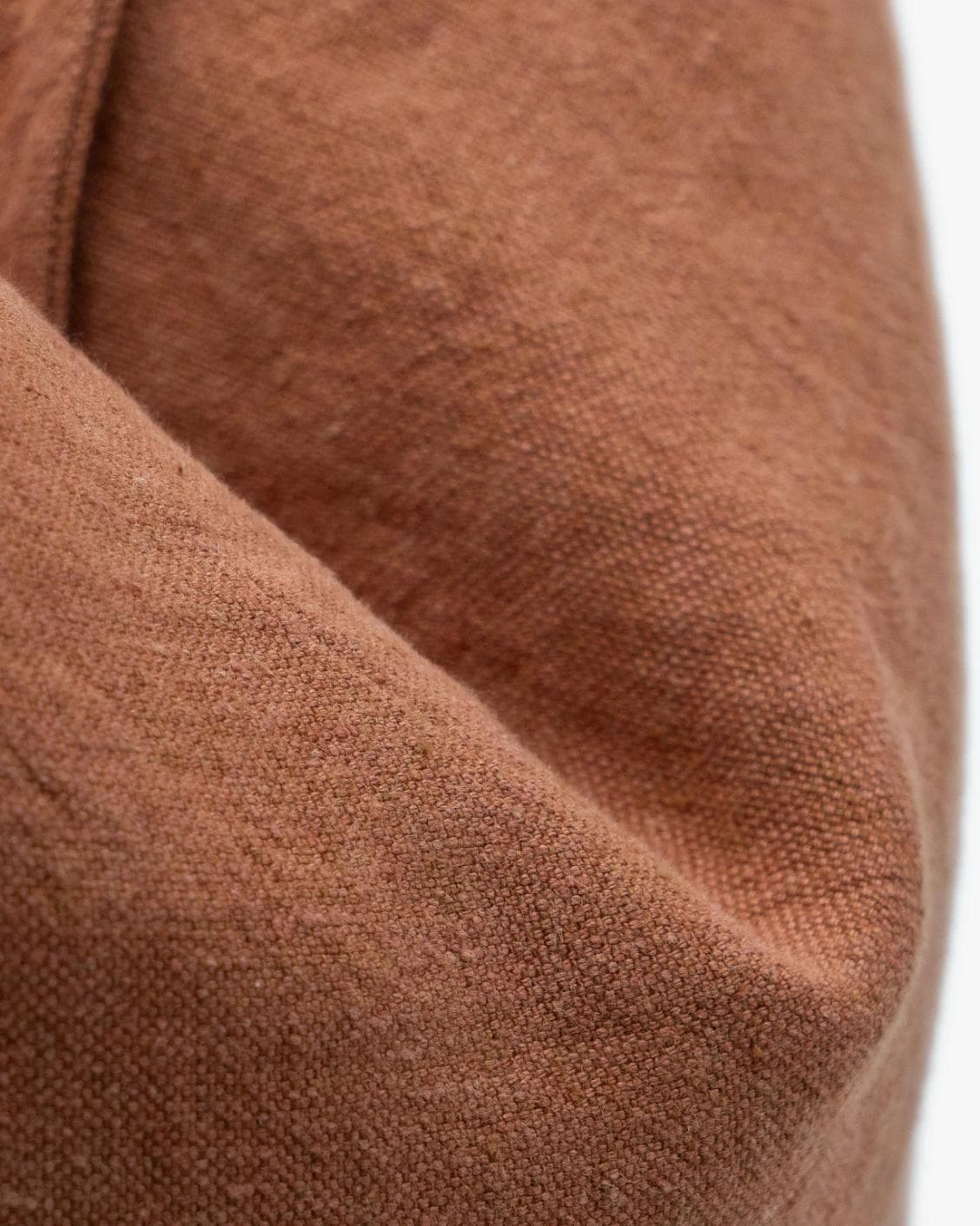 Mel Brick cushion in rust, shown in a product close-up as image 8