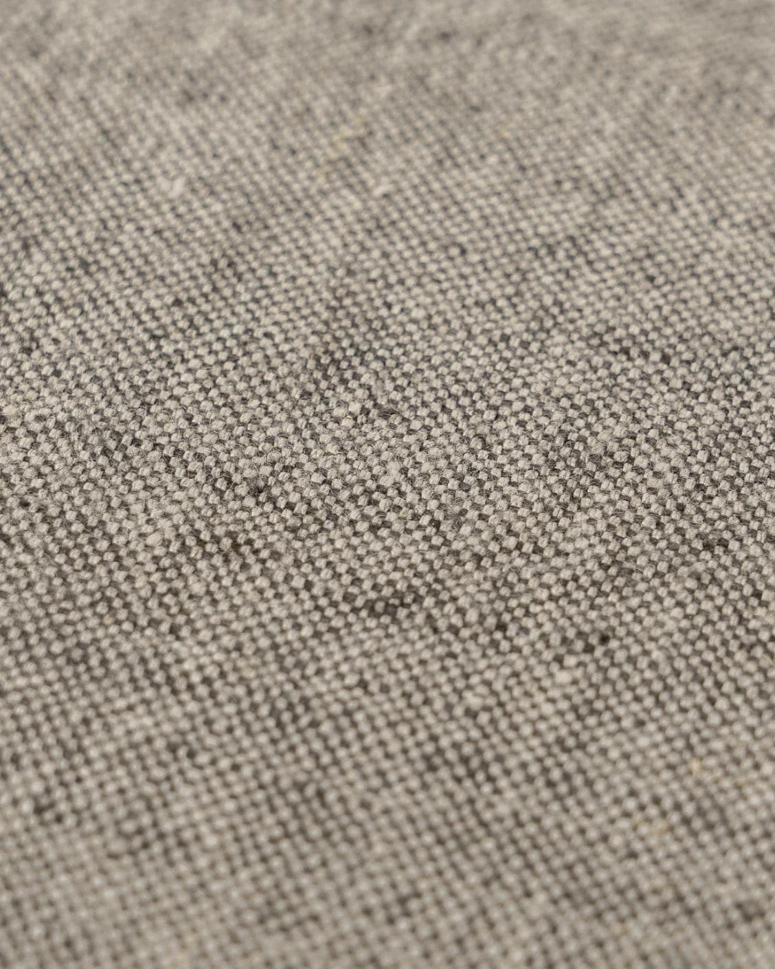 Mel Smoke cushion in linen, grey and charcoal, shown in a product close-up as image 6