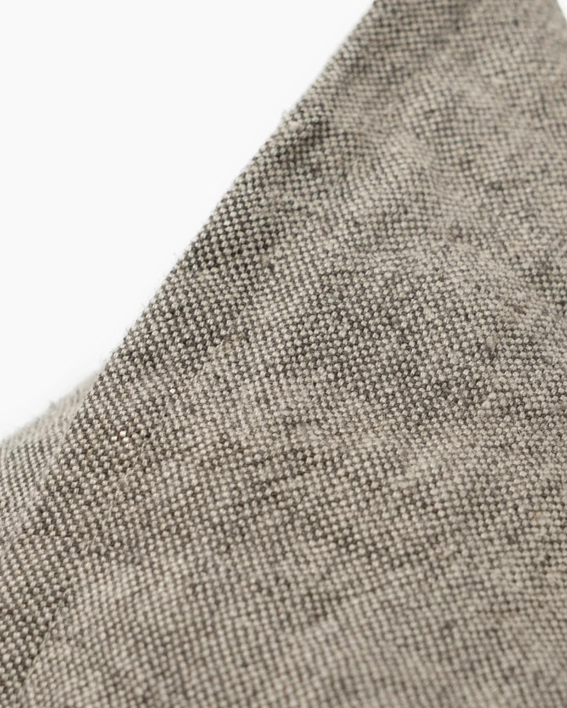 Mel Smoke cushion in linen, grey and charcoal, shown in a product close-up as image 7