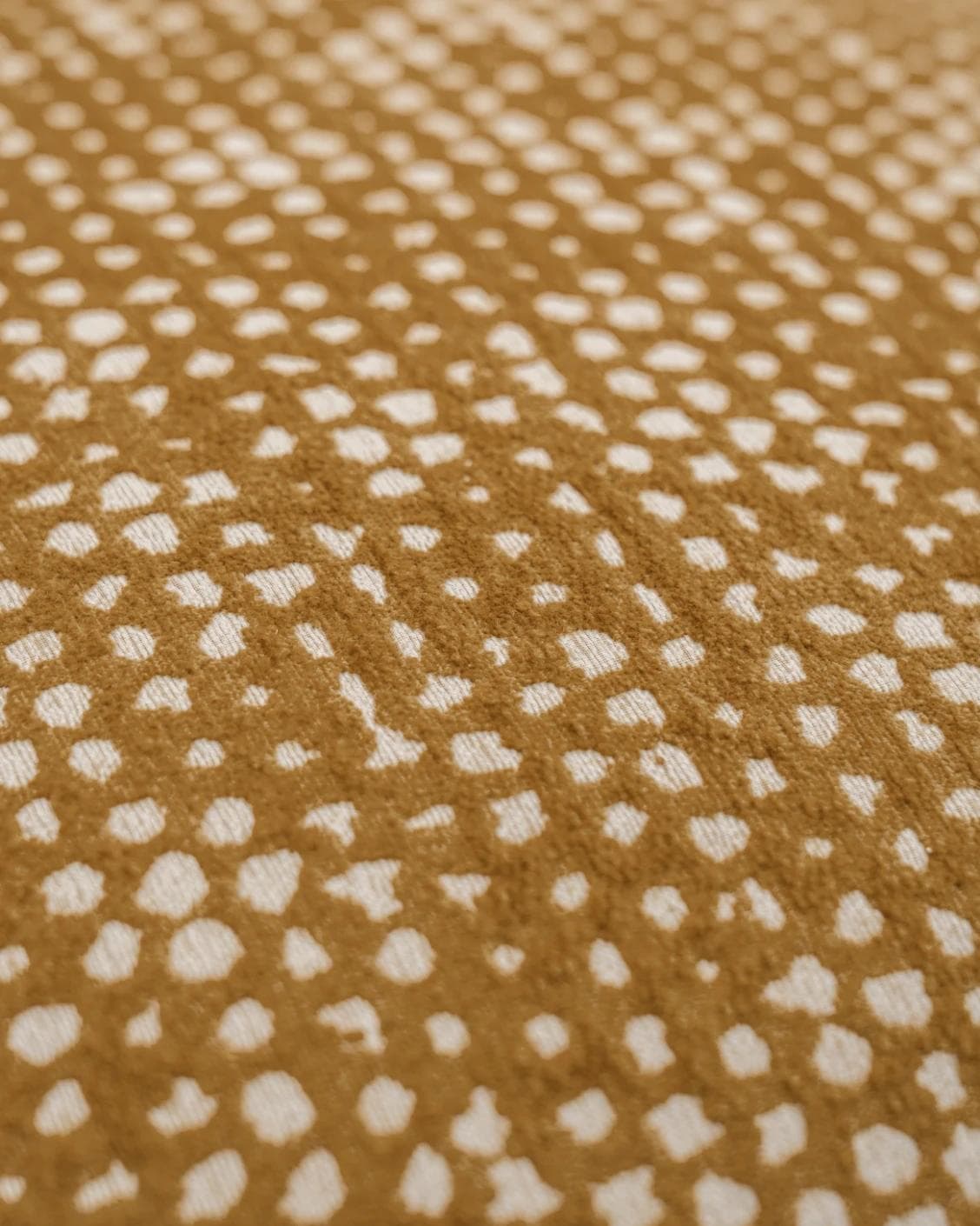 Mercy Barrymore cushion in yellow, shown in a product close-up as image 5