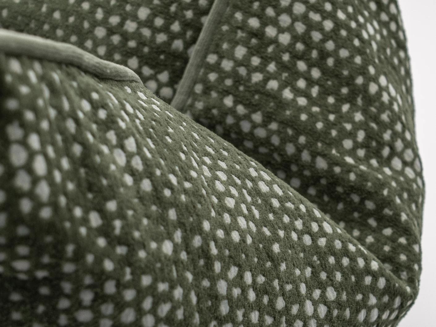 Mercy Sage cushion in green, shown in a product close-up as image 7