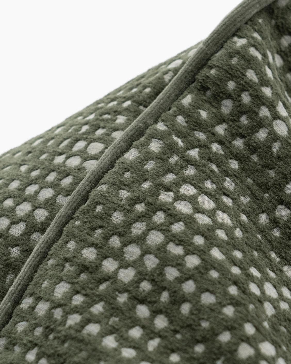 Mercy Sage cushion in green, shown in a product close-up as image 8