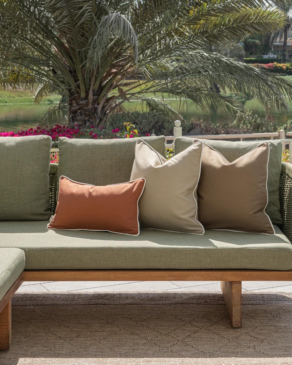 Meryl Bundle cushion in brown and rust, shown in a lifestyle front view as image 4