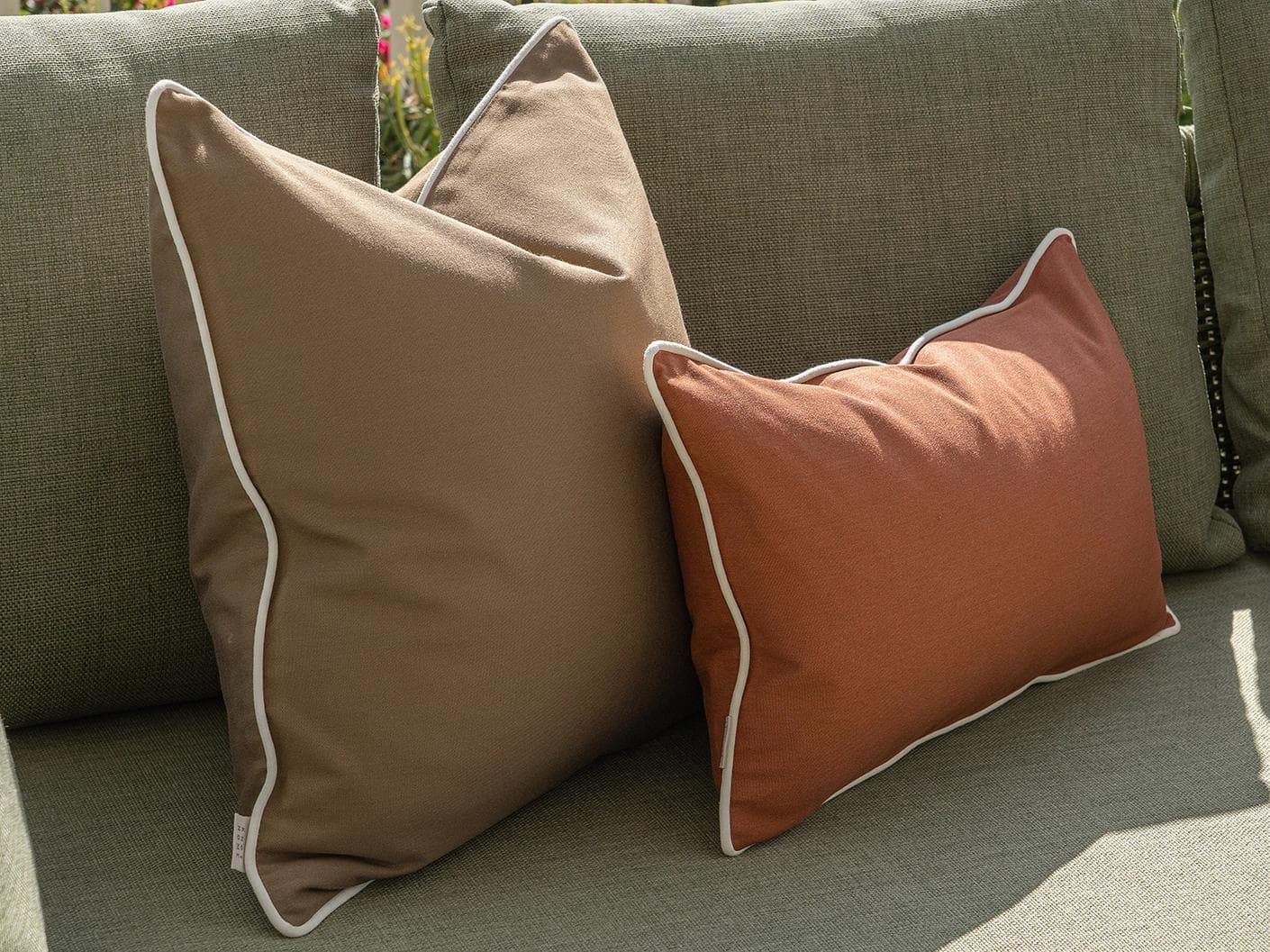 Meryl Bundle cushion in brown and rust, shown in a lifestyle left view as image 6