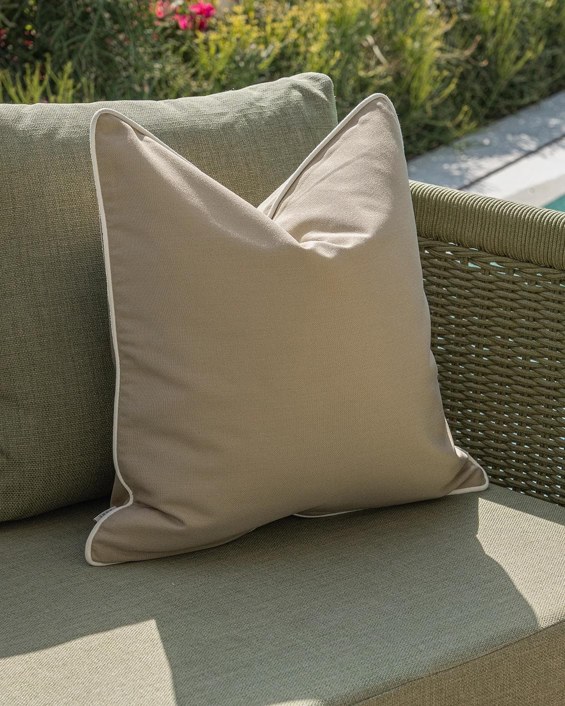 Meryl Bundle cushion in brown and rust, shown in a lifestyle left view as image 7