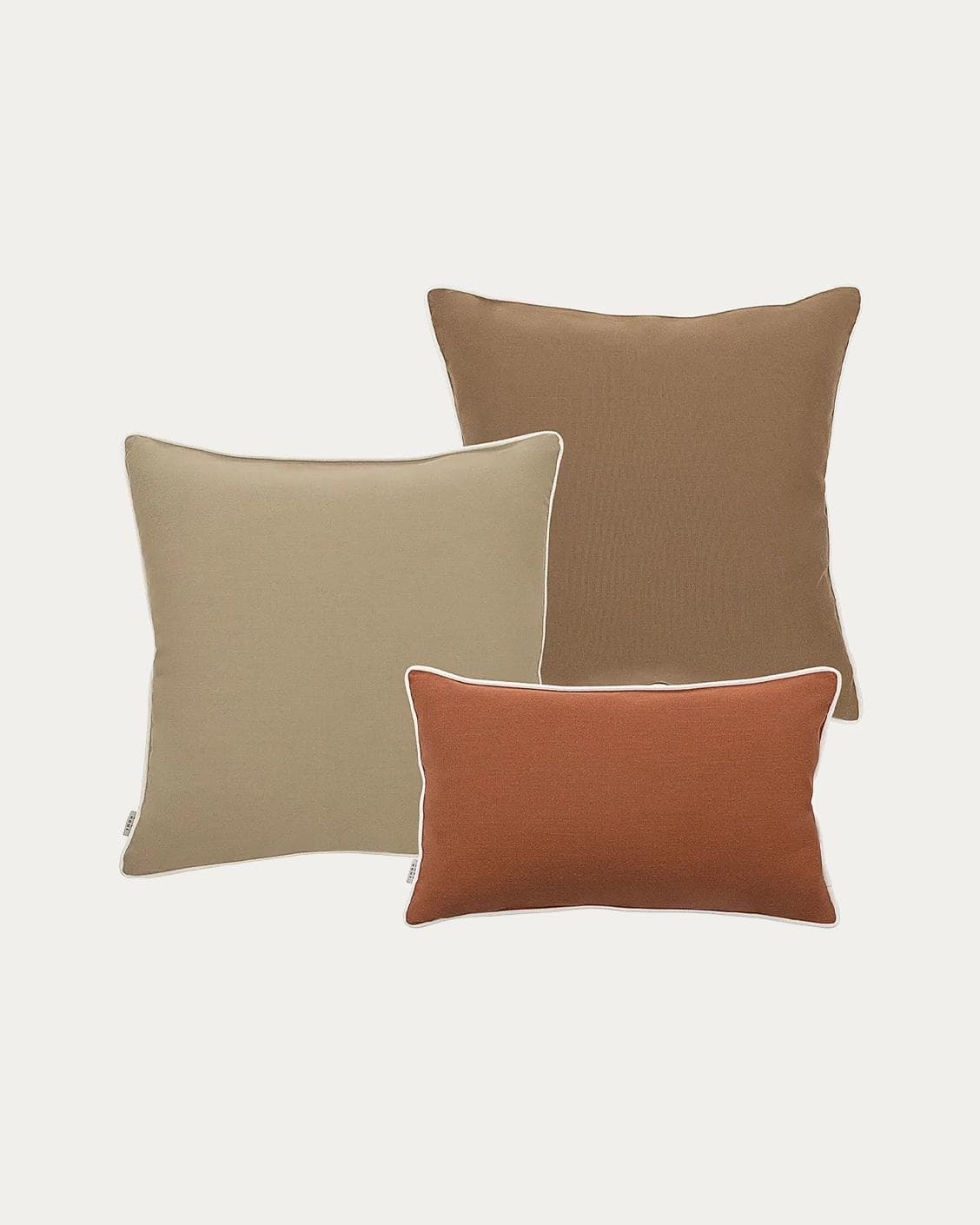 Meryl Bundle outdoor bundles in brown and rust, shown in a product as image 1
