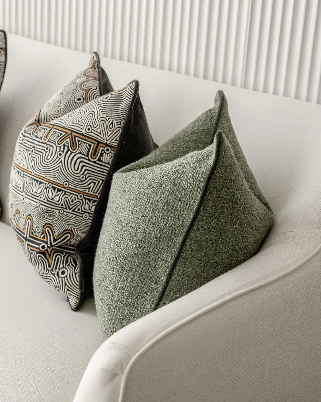 Mika Bundle cushion in black, silver and green, shown in a product right view as image 7