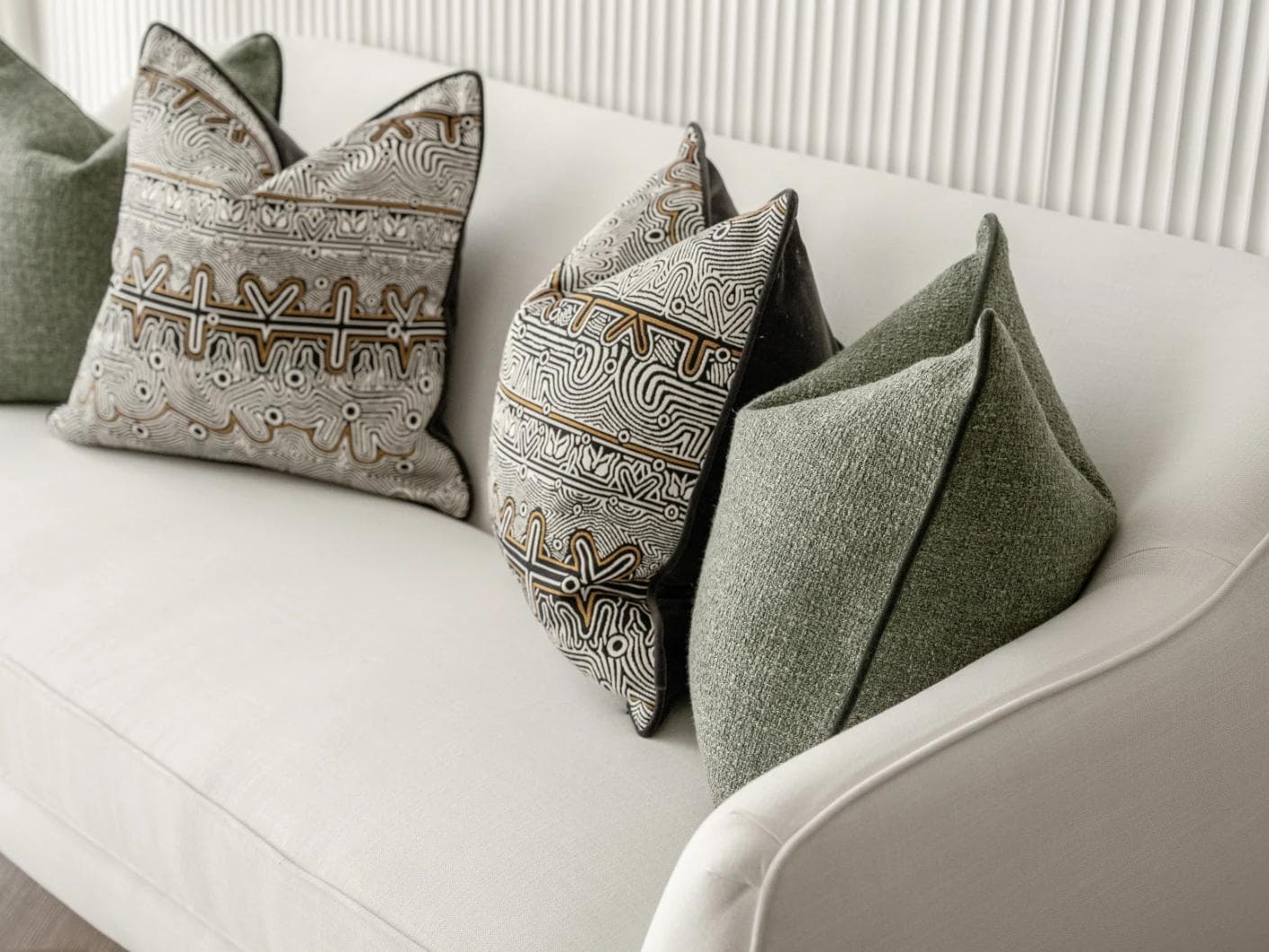 Mika Bundle cushion in black, silver and green, shown in a product right view as image 7
