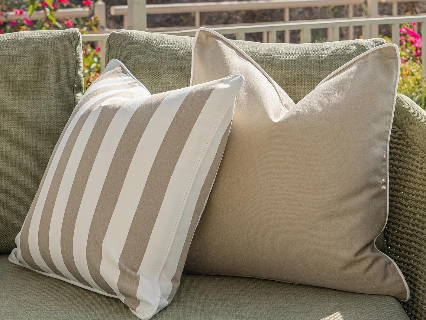 Miko Bundle cushion in brown, ivory and beige, shown in a lifestyle front view as image 5