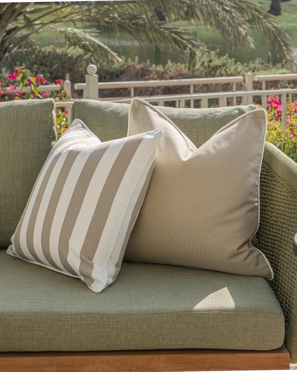 Miko Bundle cushion in brown, ivory and beige, shown in a lifestyle front view as image 5