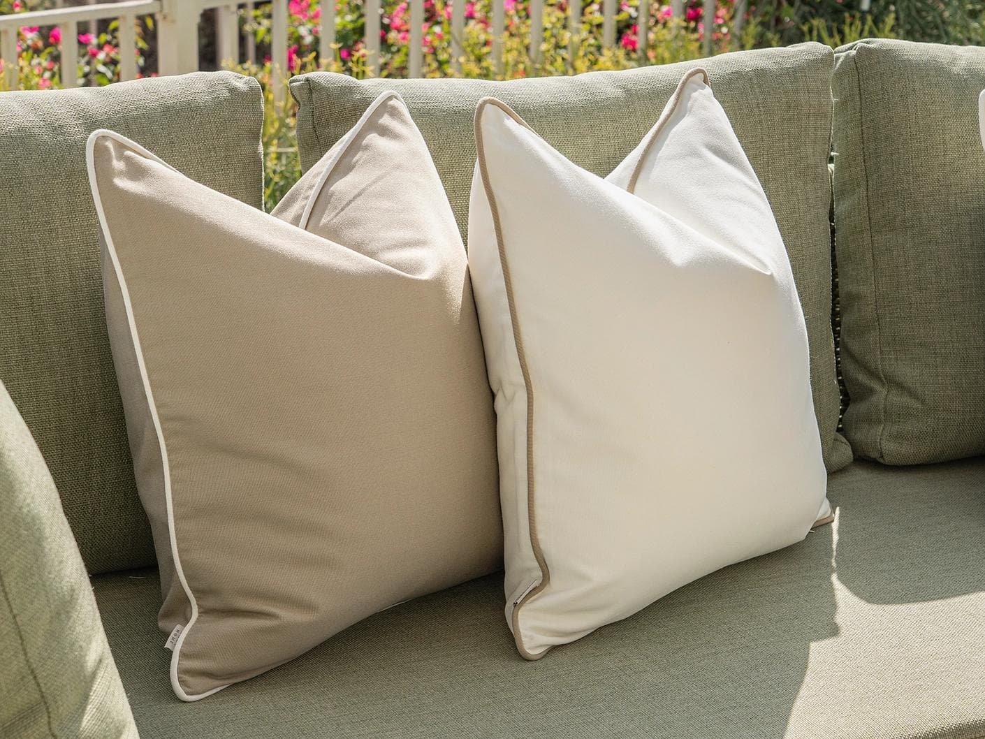 Miko Bundle cushion in brown, ivory and beige, shown in a lifestyle left view as image 6