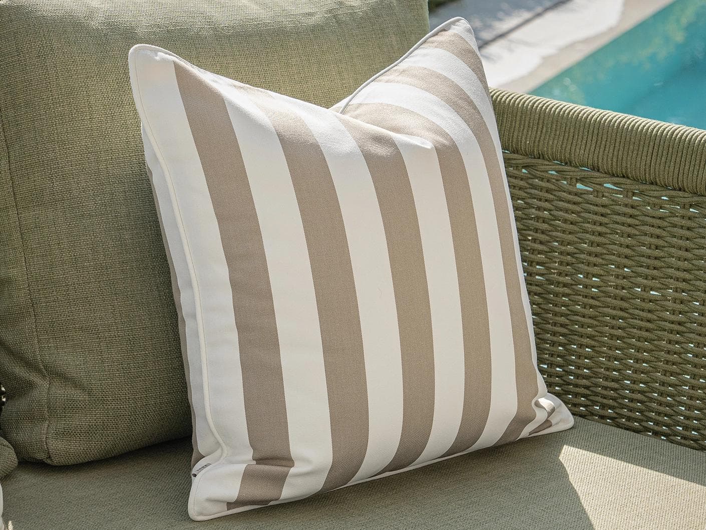 Miko Bundle cushion in brown, ivory and beige, shown in a lifestyle left view as image 7
