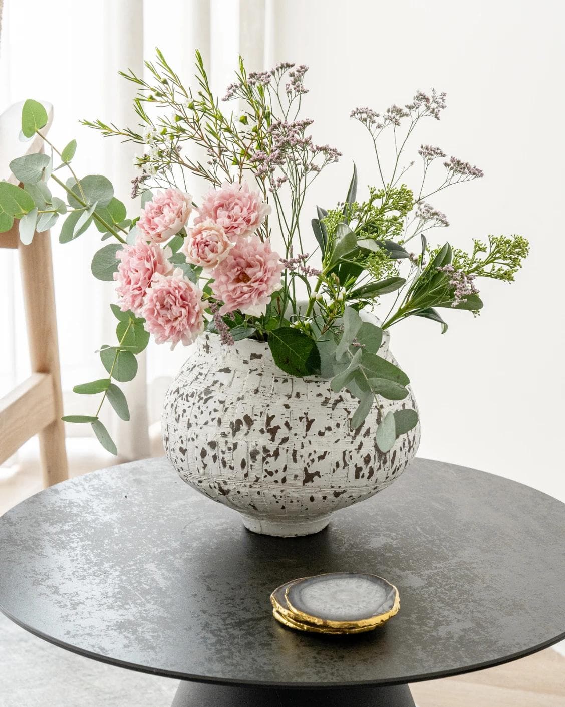 Miraflora Arneson vases in white and grey, shown in a lifestyle front view as image 5