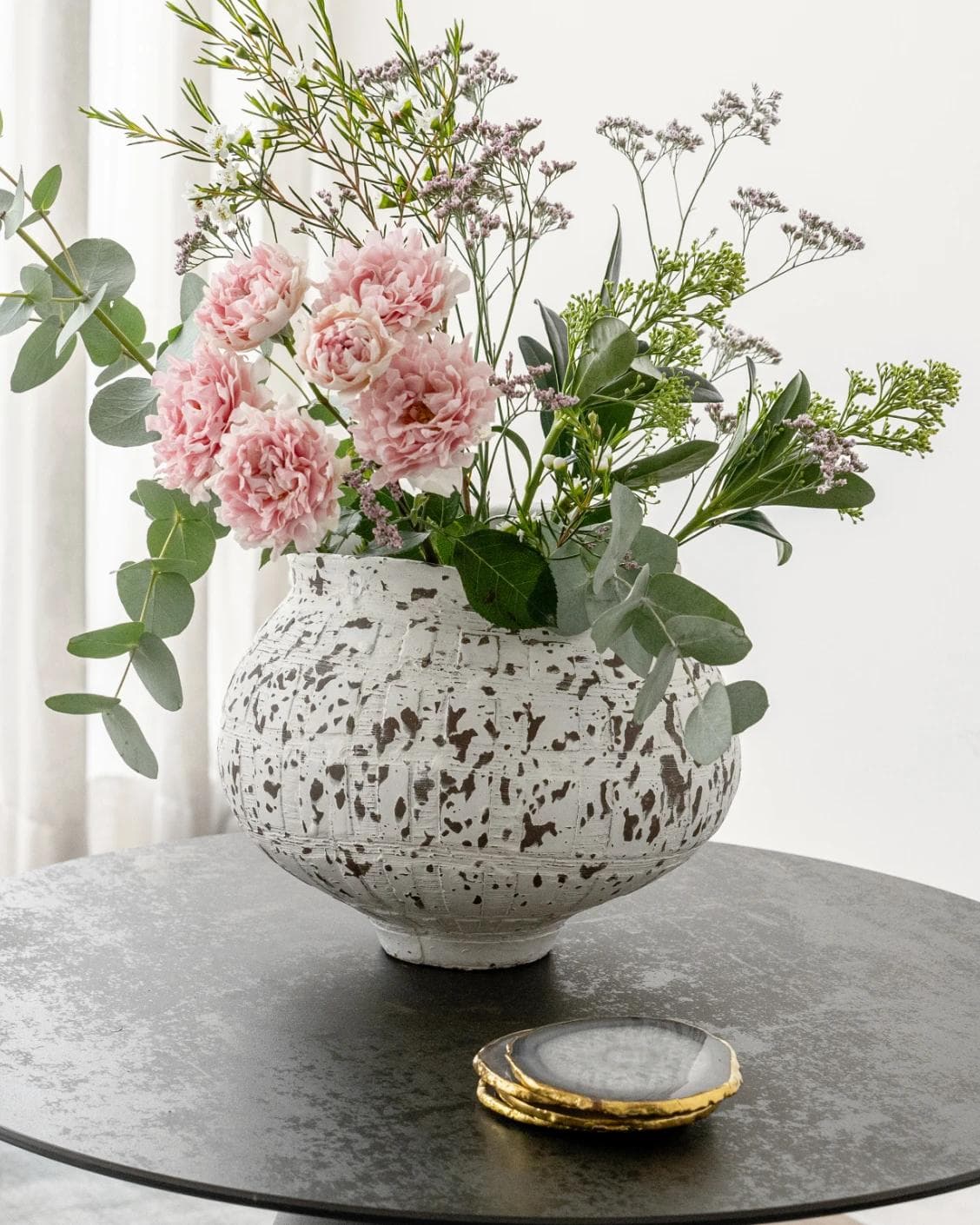 Miraflora Arneson vases in white and grey, shown in a lifestyle front view as image 6