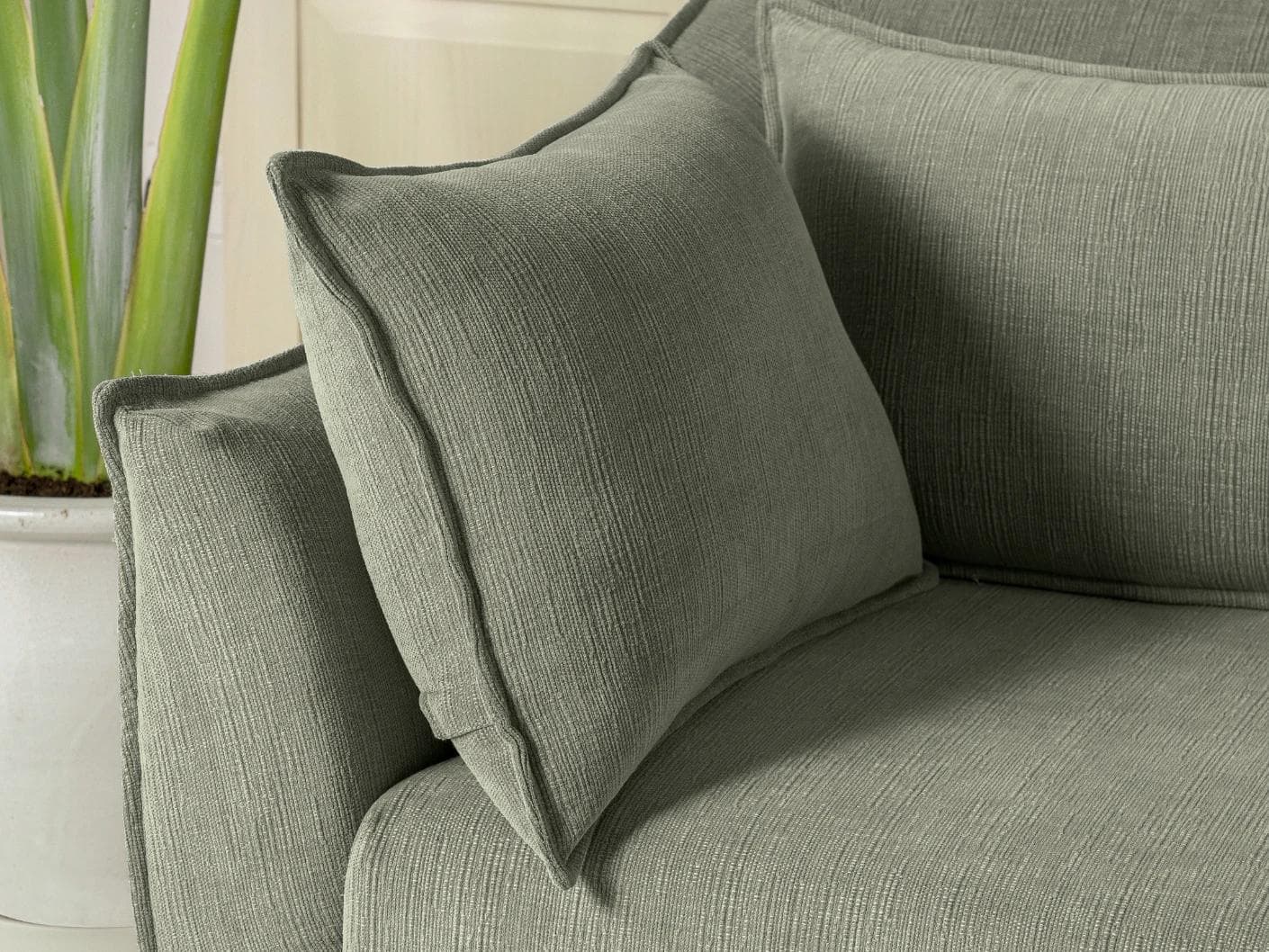 Miro Olive Grey sofa in olive grey, shown in a lifestyle right view as image 5