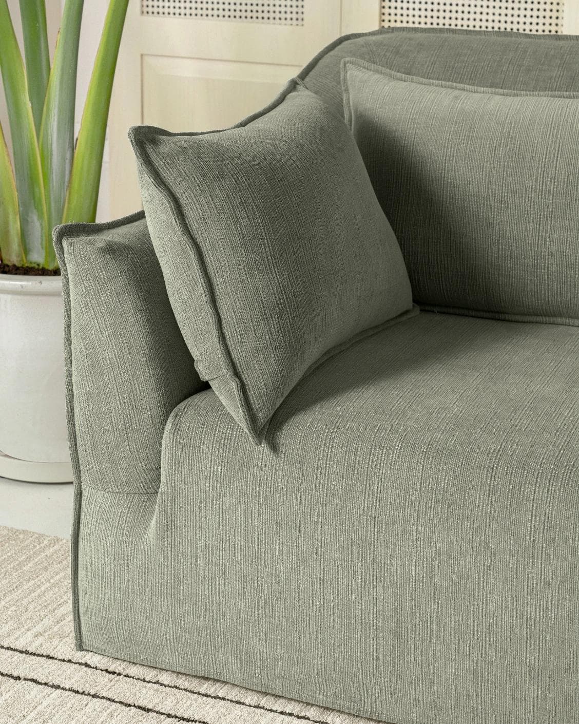 Miro Olive Grey sofa in olive grey, shown in a lifestyle right view as image 5