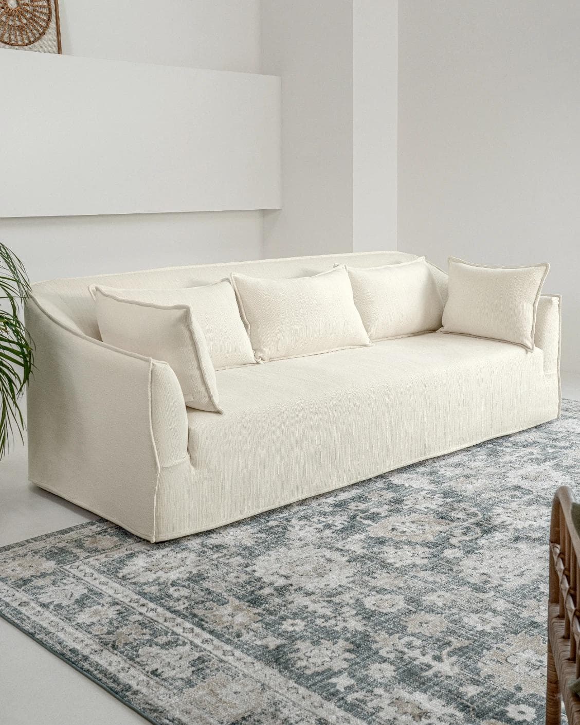 Miro Warm Ivory sofa, shown in a lifestyle left view as image 5