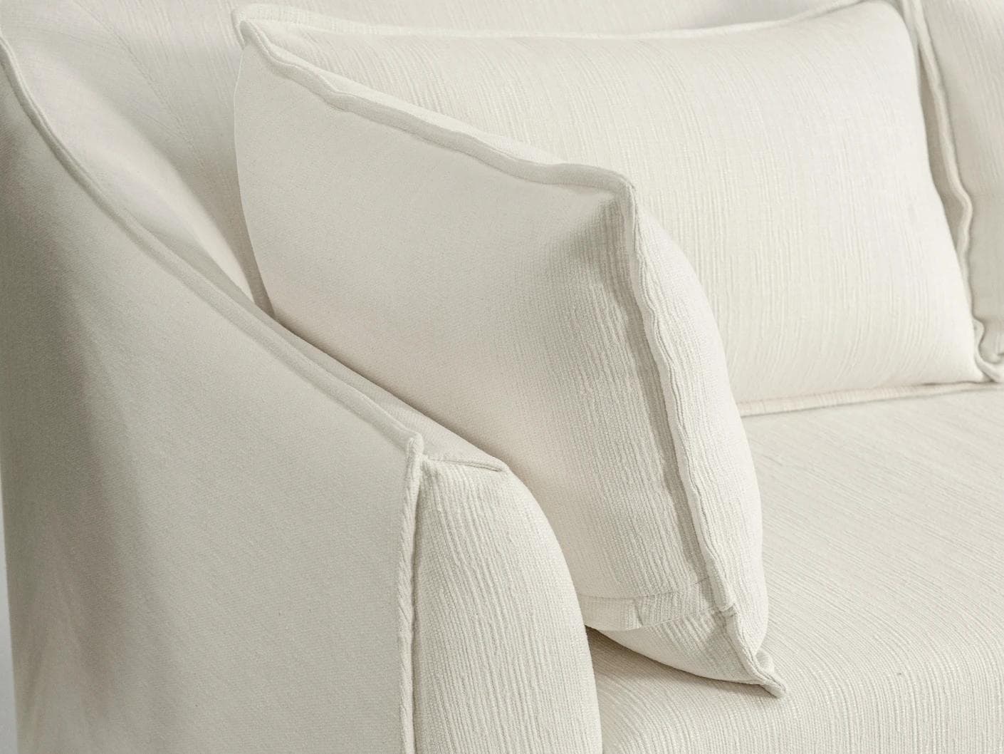 Miro Warm Ivory sofa, shown in a lifestyle left view as image 4
