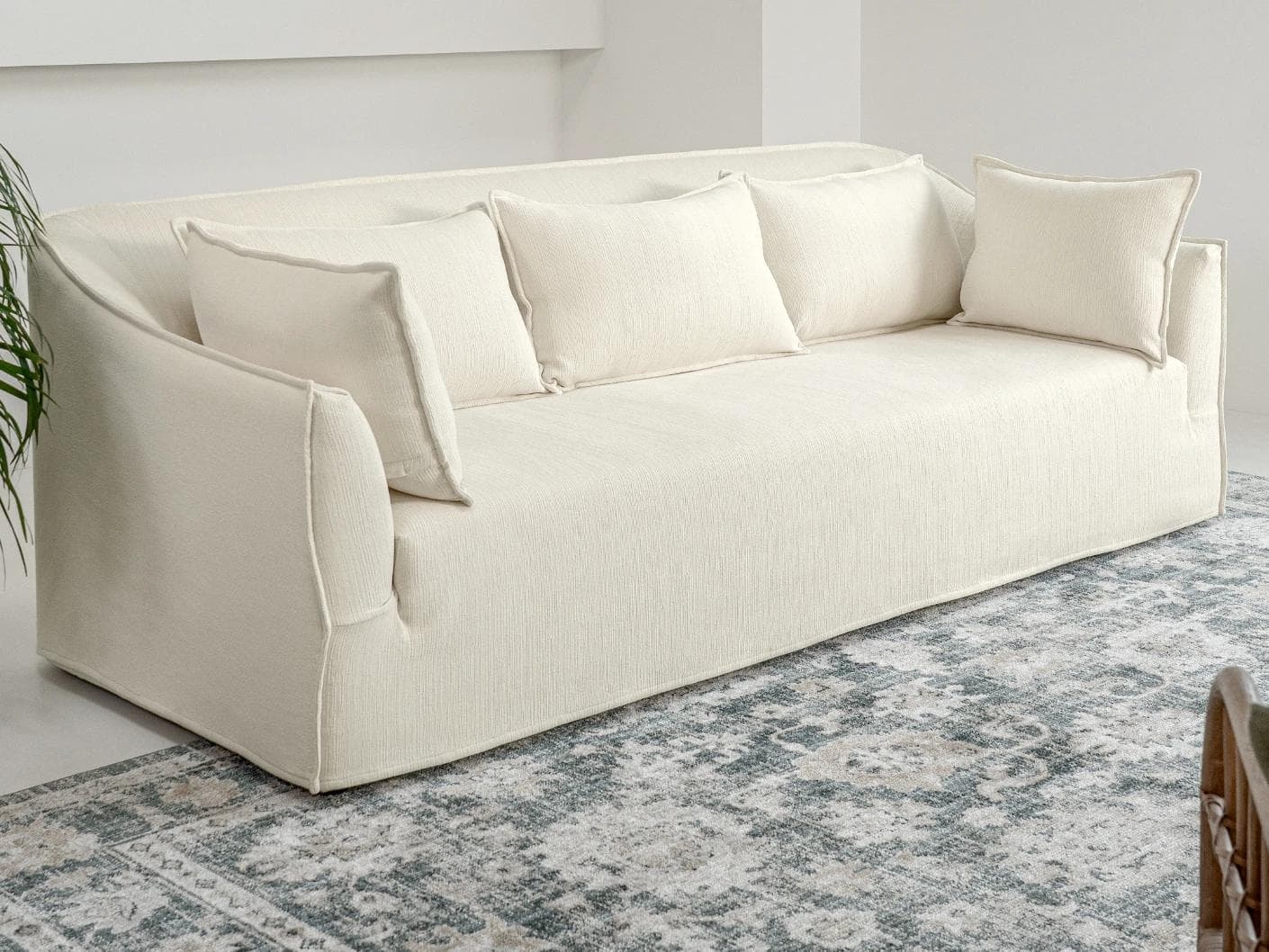 Miro Warm Ivory sofa, shown in a lifestyle left view as image 5