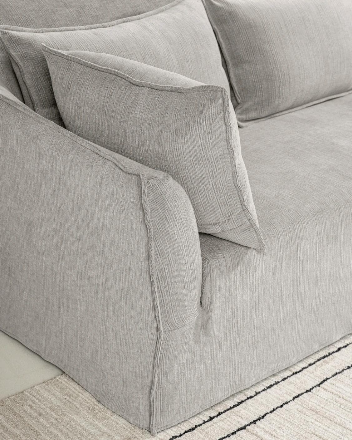 Miro Warm Stone sofa in warm stone, shown in a lifestyle left view as image 4