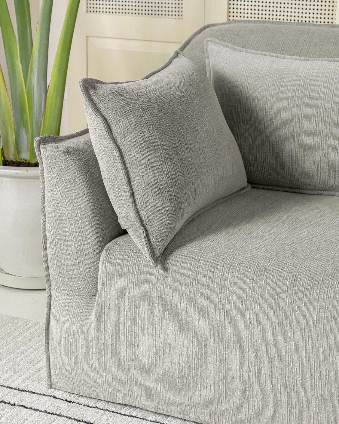 Miro Warm Stone sofa in warm stone, shown in a lifestyle right view as image 6