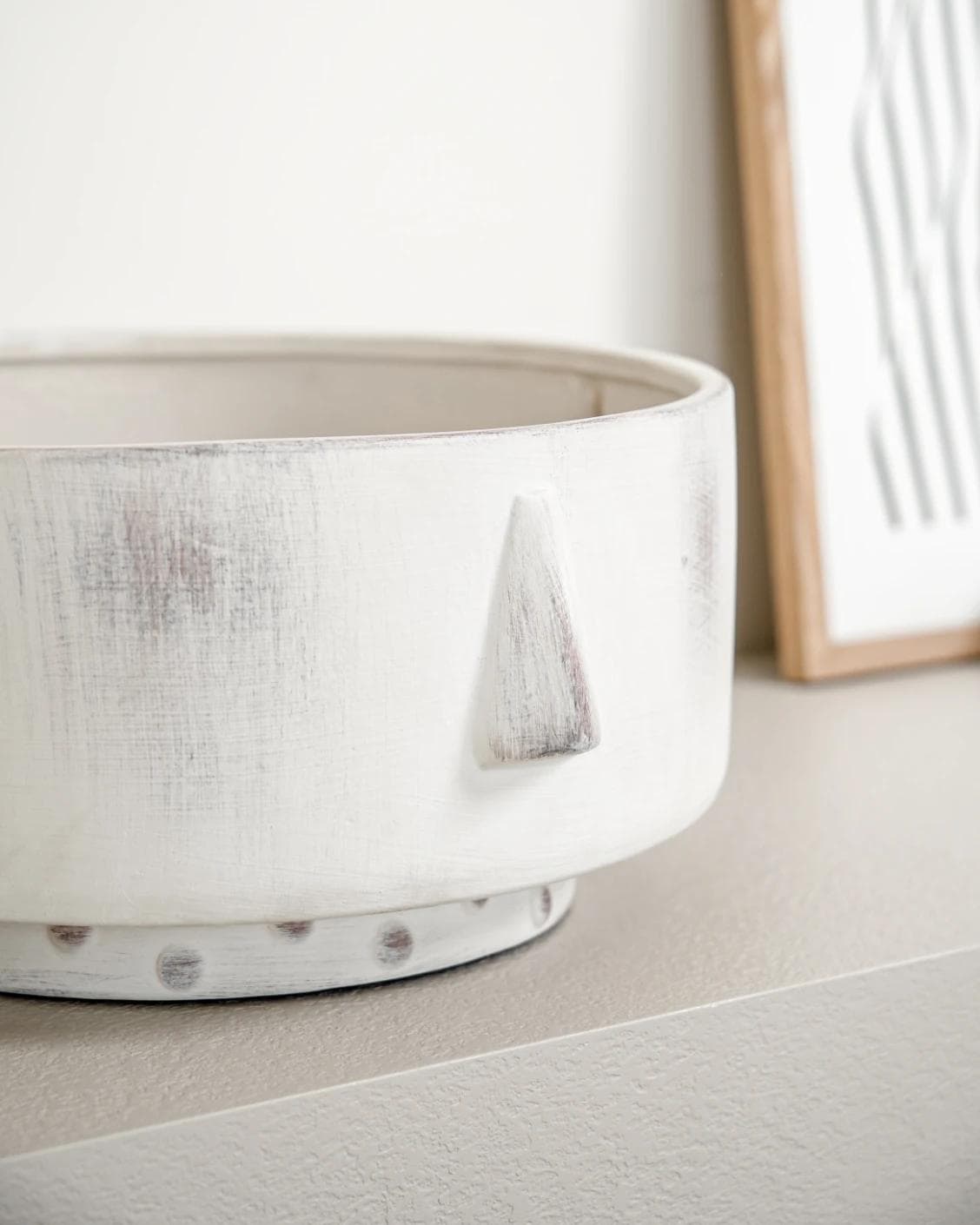 Misha Terra bowls in ivory and white, shown in a lifestyle close-up as image 4