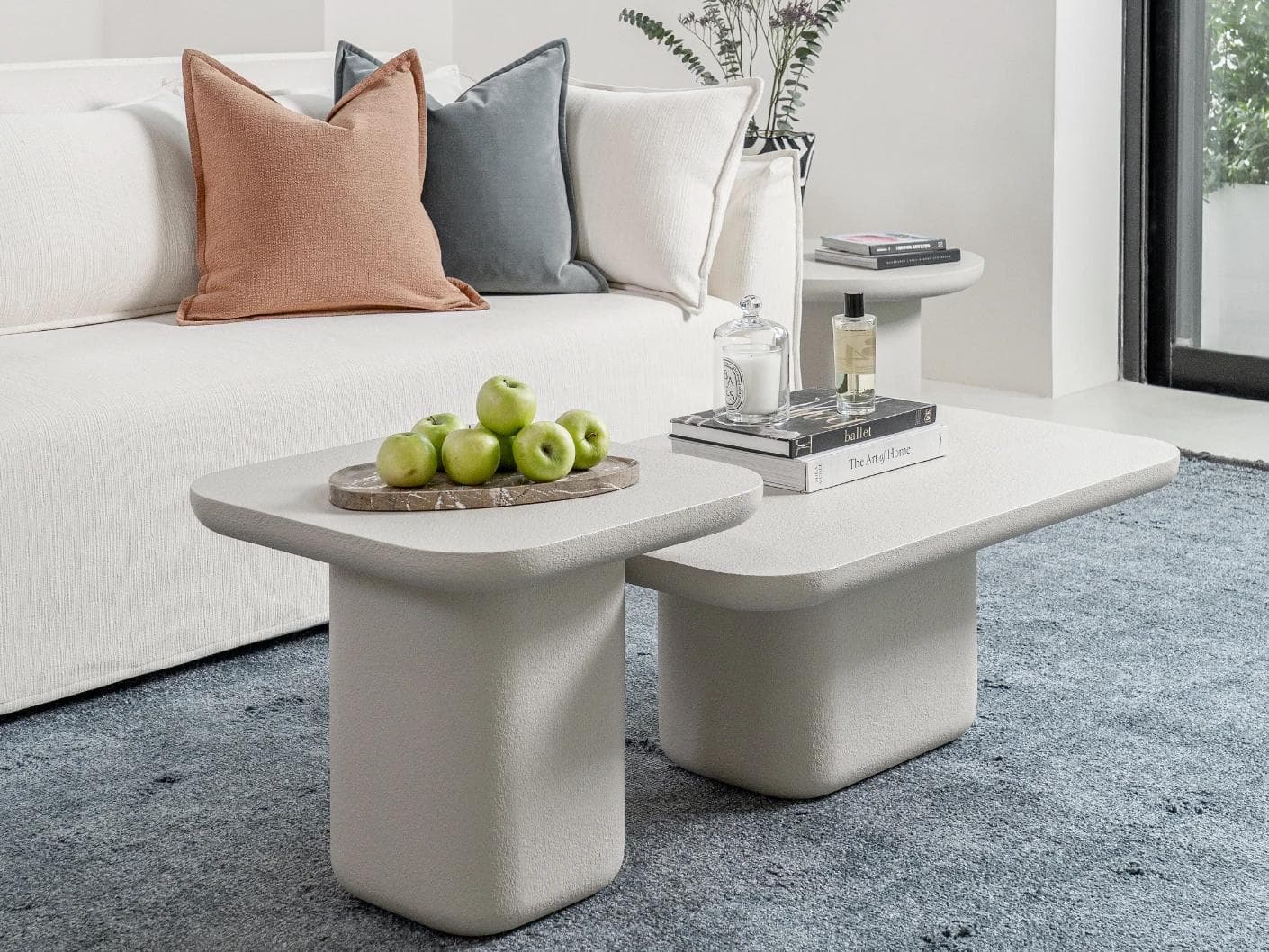 Modena Set Of 2 coffee table in soft ivory and stone, shown in a lifestyle left view as image 4