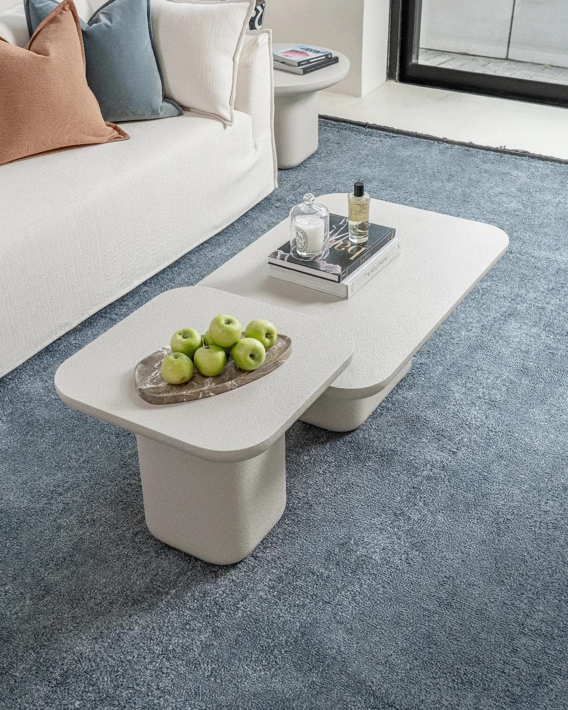 Modena Set Of 2 coffee table in soft ivory and stone, shown in a lifestyle top view as image 7