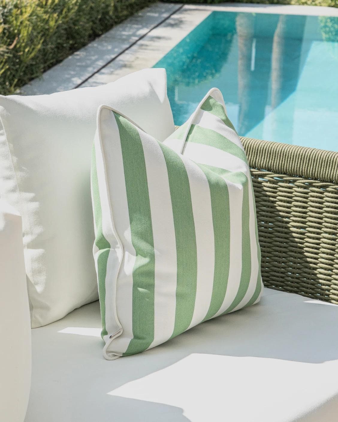 Mysha Bundle cushion in ivory and green, shown in a lifestyle left view as image 5