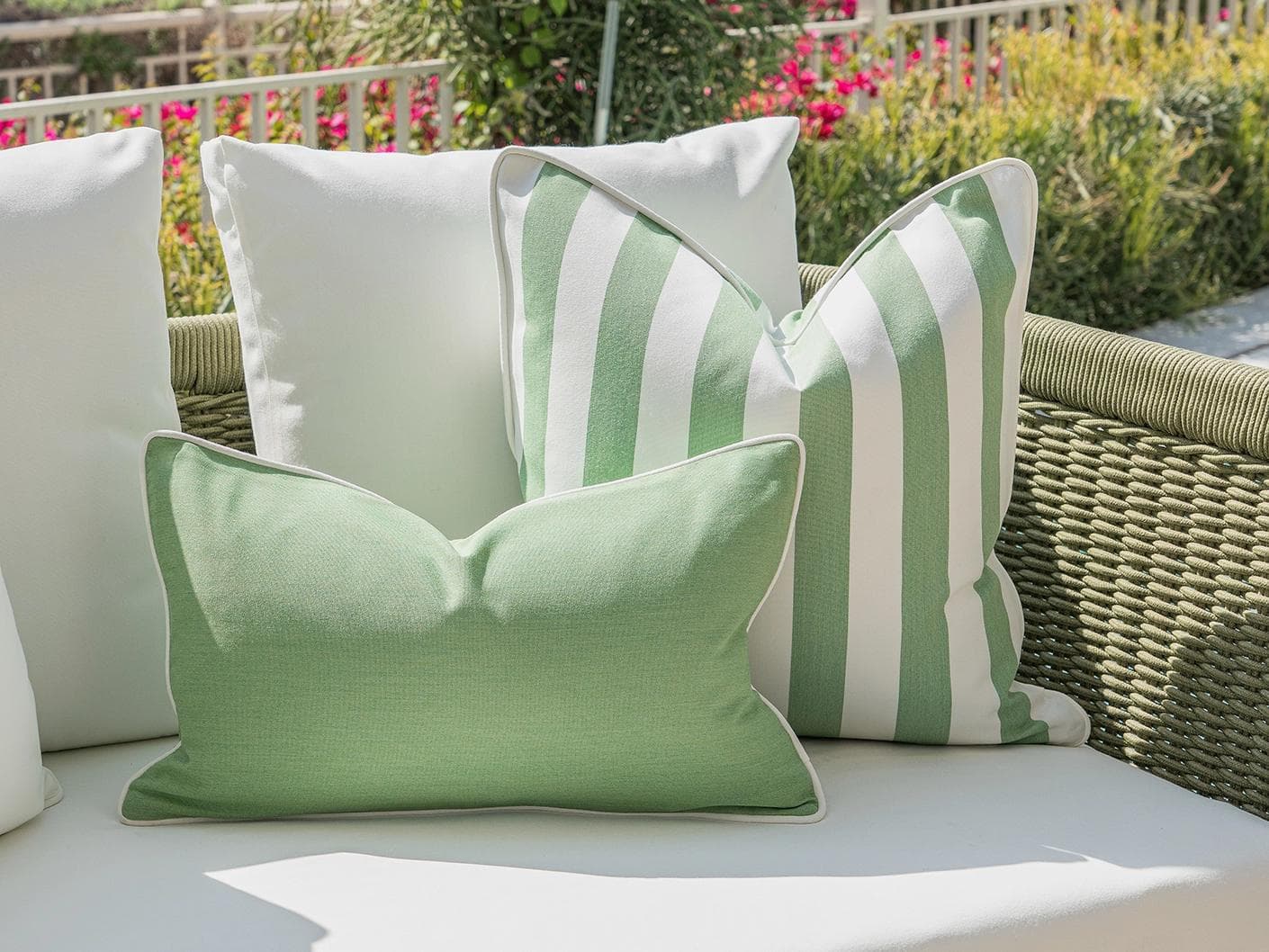 Mysha Bundle cushion in ivory and green, shown in a lifestyle left view as image 6