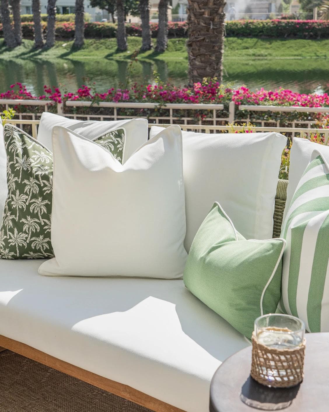 Mysha Bundle cushion in ivory and green, shown in a lifestyle right view as image 7