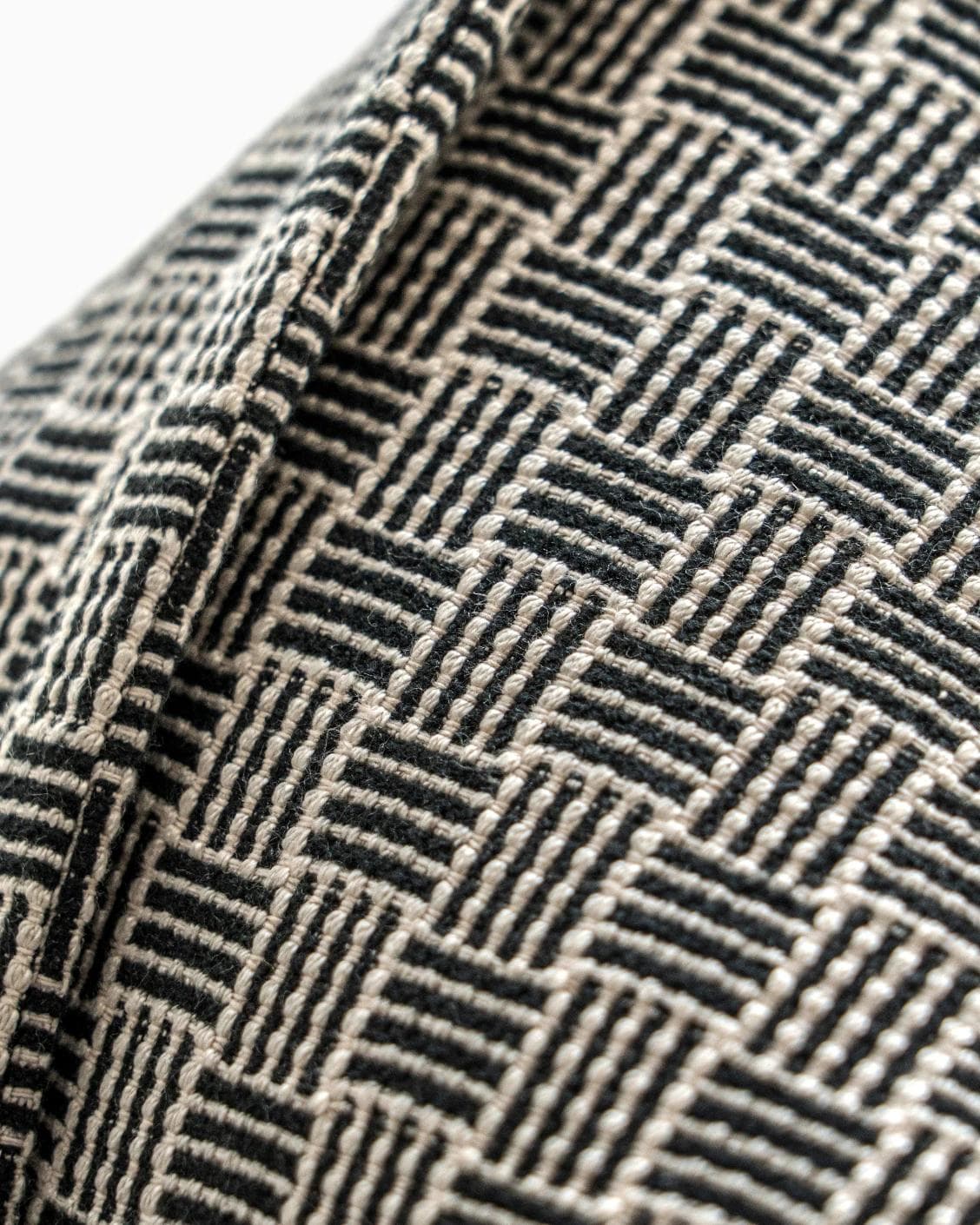Naomi Steele cushion in grey, shown in a product close-up as image 7