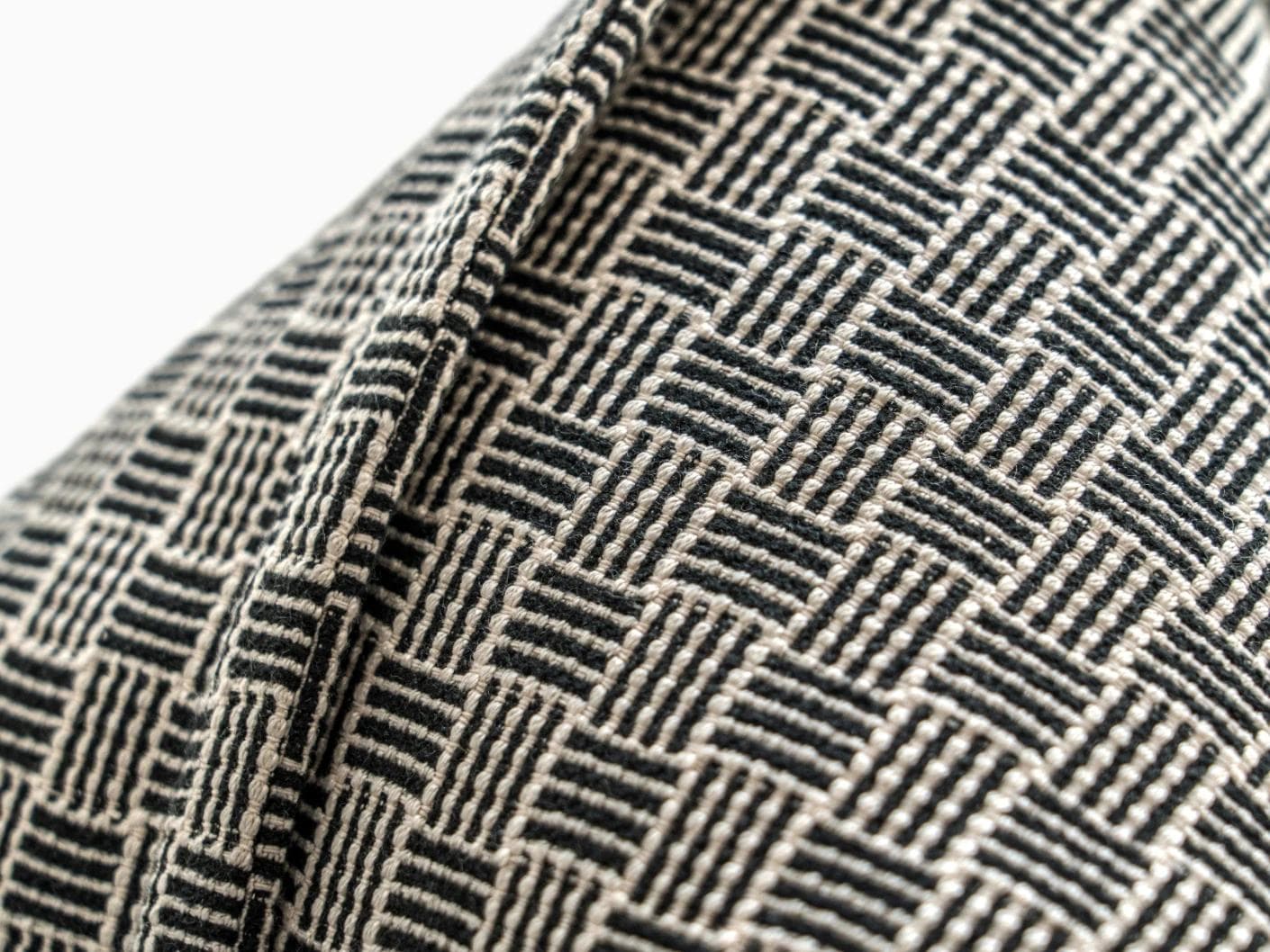 Naomi Steele cushion in grey, shown in a product close-up as image 7