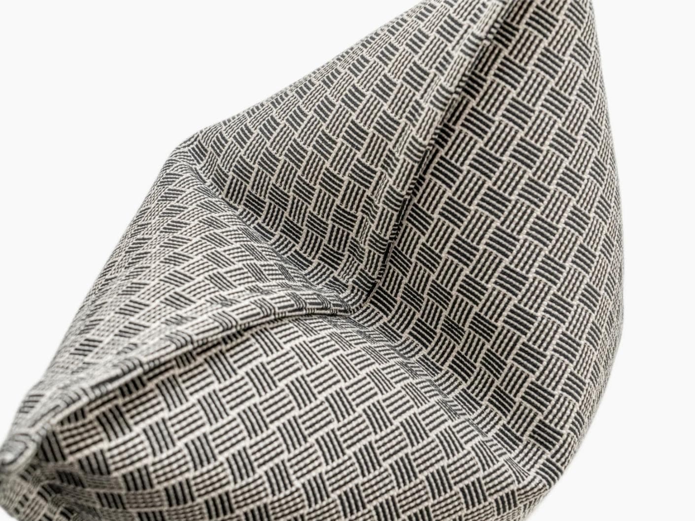 Naomi Steele cushion in grey, shown in a product top view as image 9