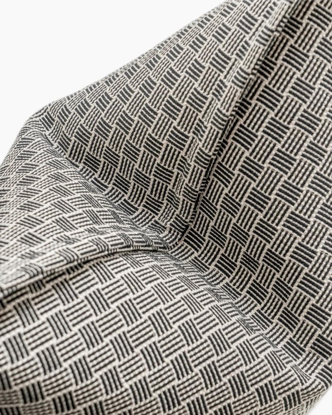 Naomi Steele cushion in grey, shown in a product top view as image 9