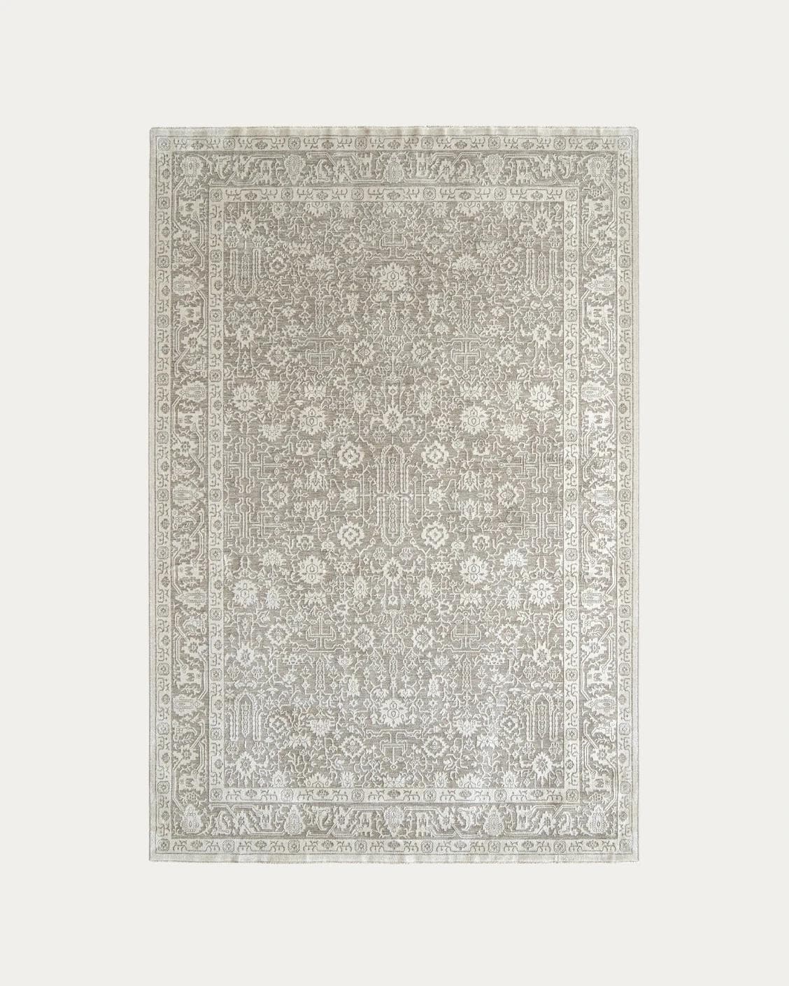 Natalia Sandy carpets in beige and grey, shown in a product top view as image 1