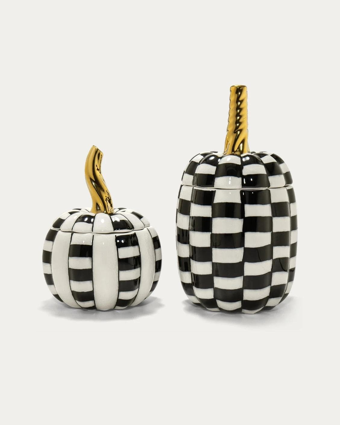 Naveah Arneson Bundle canisters in white, black and gold, shown in a product front view as image 1