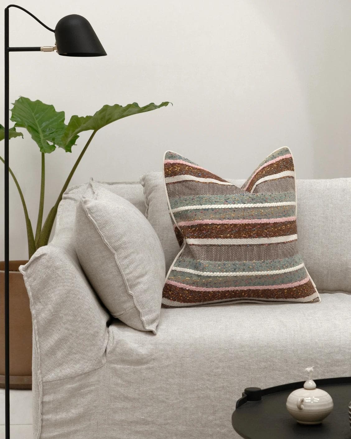 Naysa Alecia cushion in multicolour, shown in a lifestyle front view as image 4