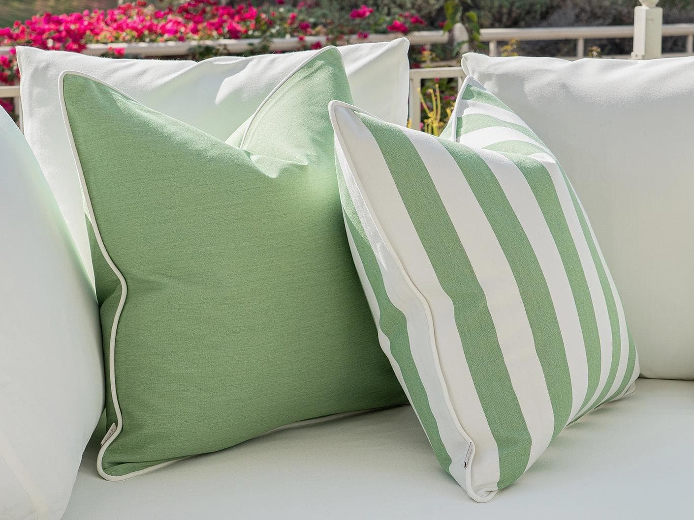 Nehal Bundle cushion in green, shown in a lifestyle front view as image 5