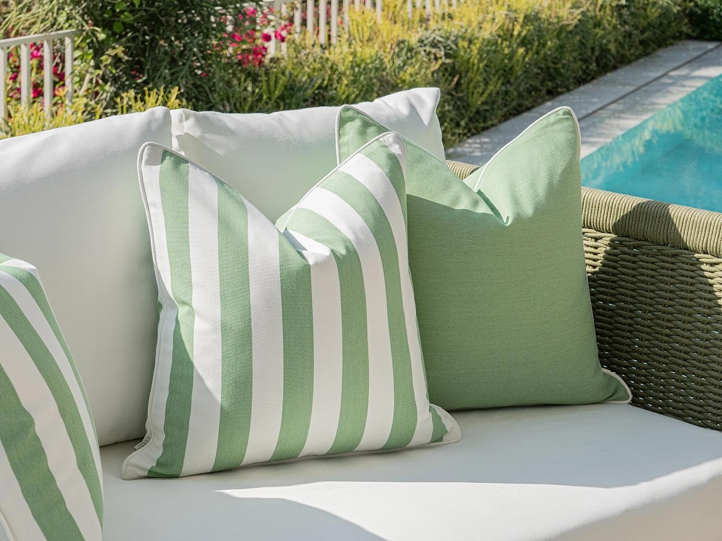 Nehal Bundle cushion in green, shown in a lifestyle left view as image 6