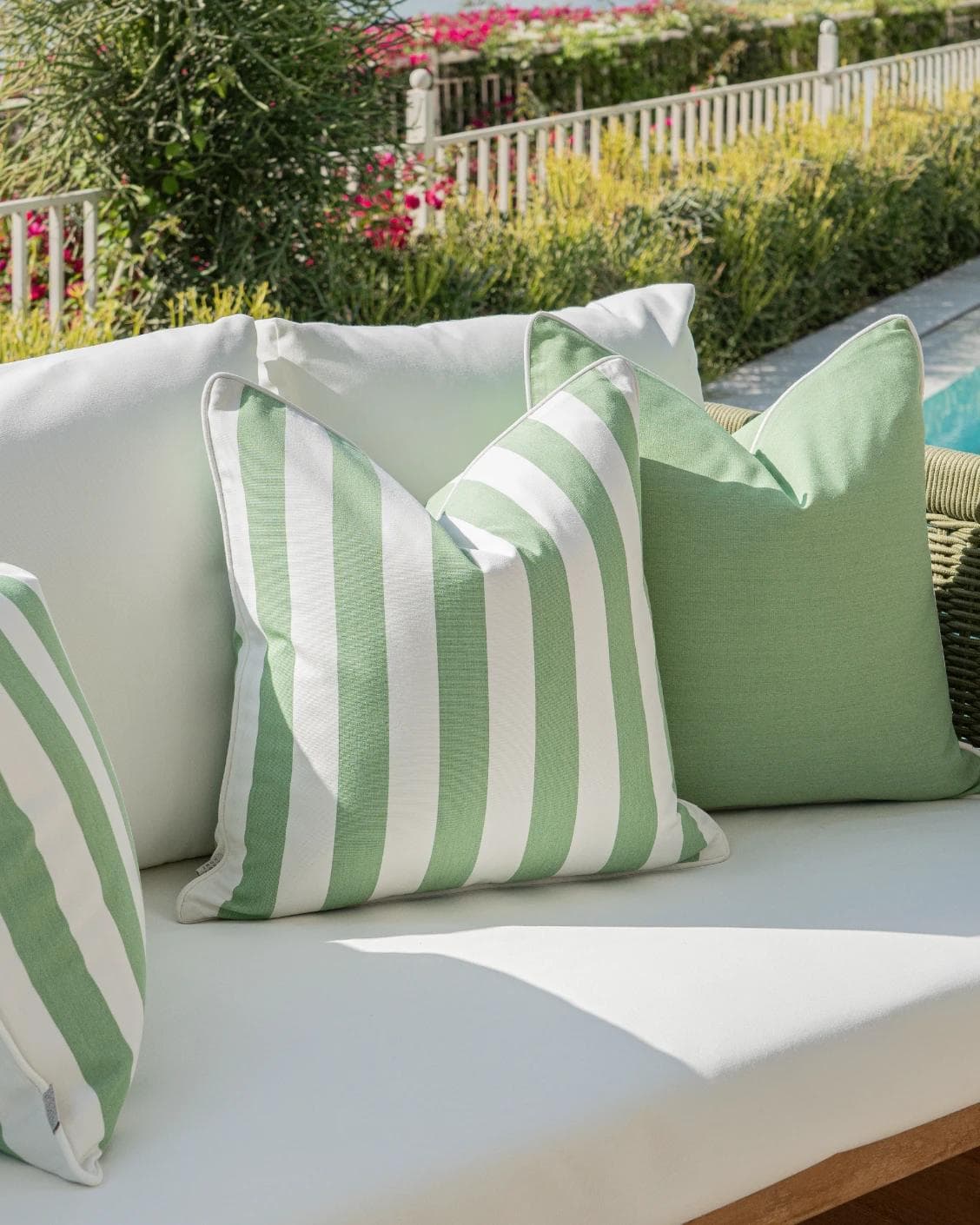 Nehal Bundle cushion in green, shown in a lifestyle left view as image 6