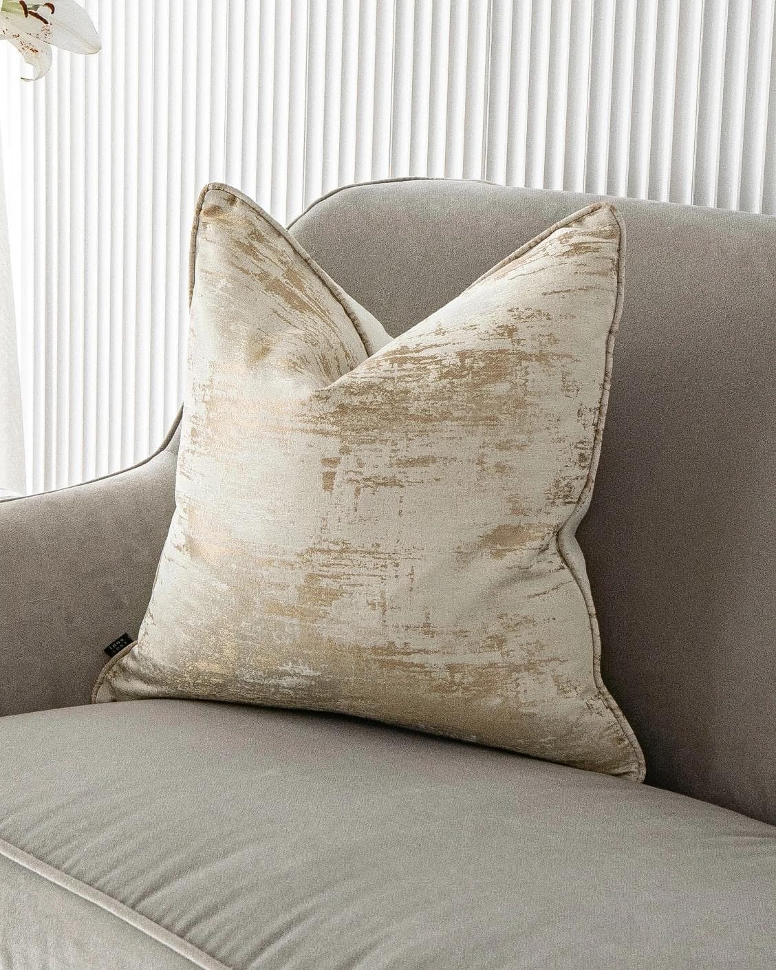 Neri Klimt cushion in gold and beige, shown in a lifestyle as image 2