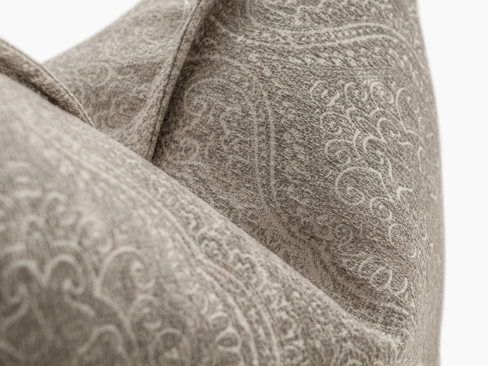 Nia Laurent cushion in taupe and grey, shown in a product close-up as image 2